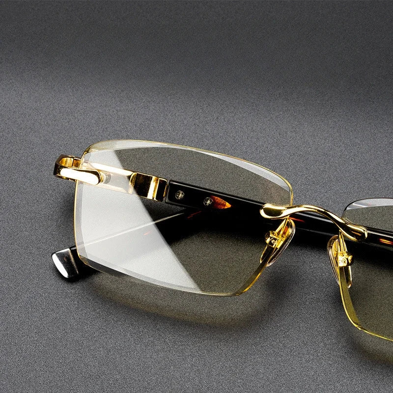Detail of gold rimless glasses with tortoiseshell temple and nose pads