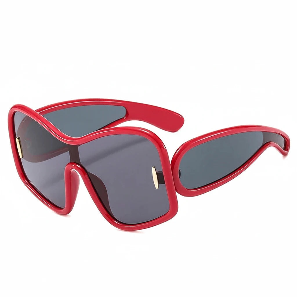 Red frame oversized shield sunglasses with dark lenses side view