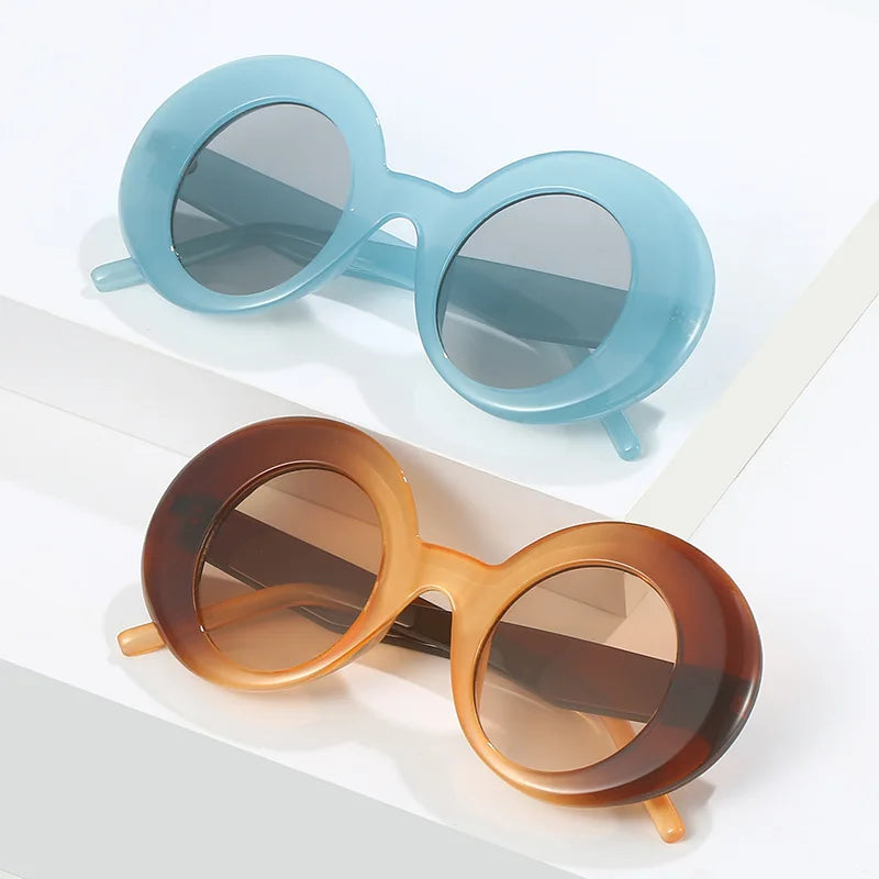 Blue and amber oversized round sunglasses with gray and brown lenses