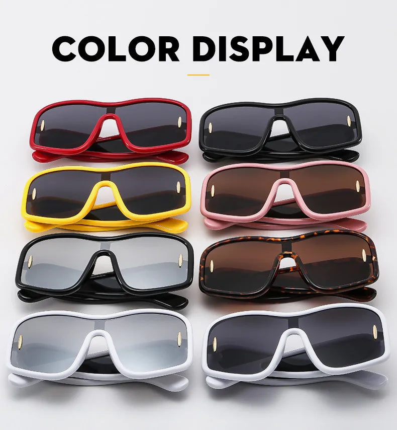Eight pairs of oversized shield sunglasses in various colors displayed flat
