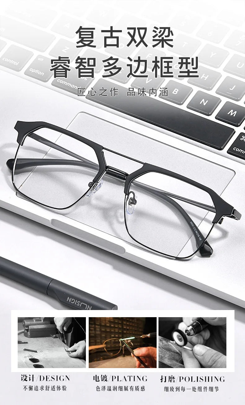 Reading glasses with double-bridge design on a laptop keyboard