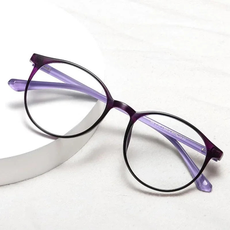Purple frame reading glasses on display