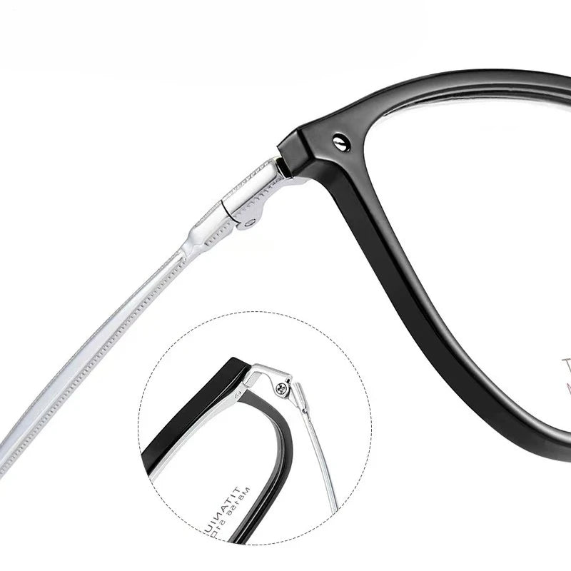Detail view of black frame titanium reading glasses hinge