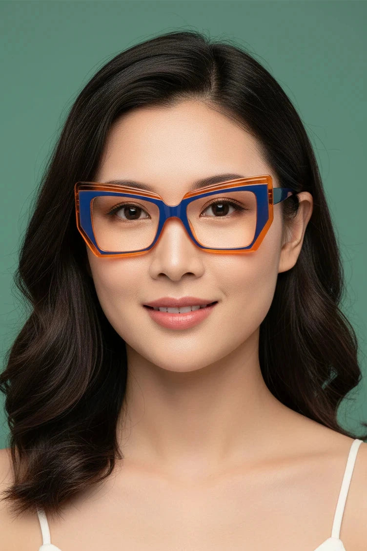 Woman wearing retro blue and orange cat eye glasses
